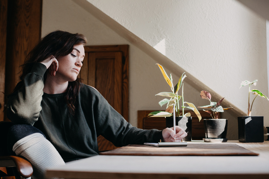 girl-serious-writing-inside-plants