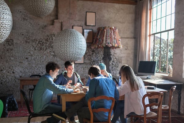 teens-group-table-collaborating-inside-2